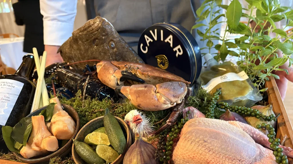 Selection of ingredients including turbot, lobster, crab, figs, and Kampot pepper at Odette pop-up Tivoli
