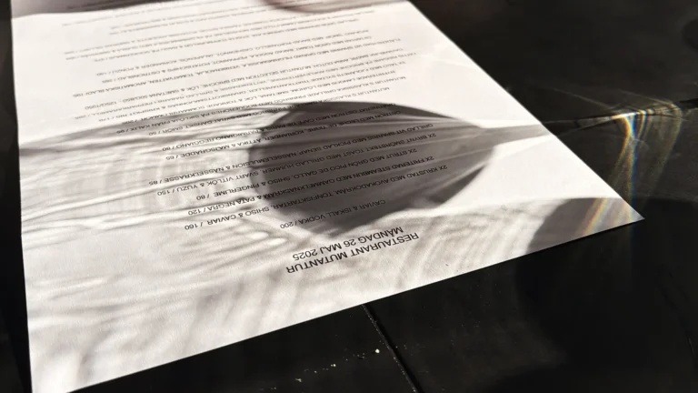 Afternoon light over the menu at Restaurant Mutantur capturing a quiet moment before service begins